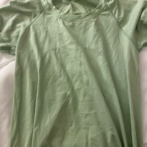Size 6 lime green lululemon swiftly tech (tag cut off)